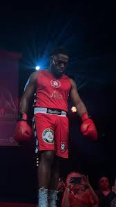 Paul-Japhet Mwanjwango entrée ring boxe gants rouges Cristal Boxing Event 9