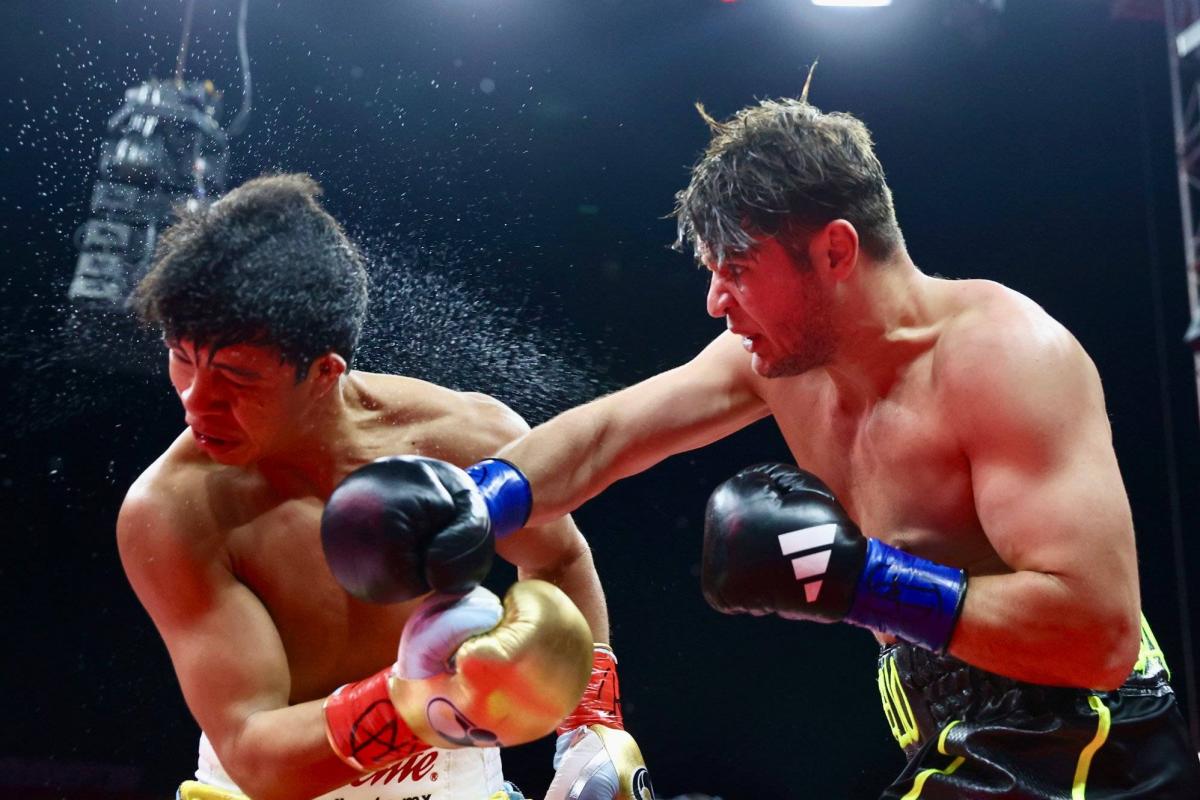 Bruno Surace frappe jab combat boxe super-moyens 2026 - droite dévastatrice dans le ring
